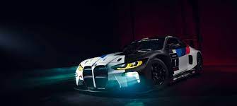 The exhaust exits just ahead of the passenger side. Bmw M4 Gt3