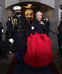 Film dari trilogi buku the hunger games karangan suzanne collins kembali tayang. Lady Gaga S Inauguration Look Is Symbolic