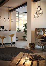 Wohnzimmer Und Esszimmer Im Loft Und Industrial Stil Schlau Kombiniert Schwarze Lampen Aus Metall Schwarze Lampe Industrieller Stil Speisezimmereinrichtung