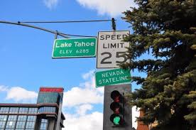 Lake tahoe is located on the border of california and nevada about 200 miles north east of san francisco. At The Nevada California Border Photo