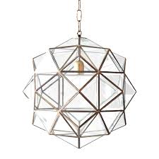 Modern pendant light fixtures are popular in homes where the kitchen gracefully spills into the dining area. Granada Lanterns L Aviva Home
