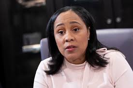 Fani Willis takes stand in Trump election case