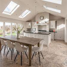 Doorways on either side of the range wall open to a staircase and a living area to ease movement throughout the home. 30 Spacious And Airy Open Plan Kitchen Ideas Digsdigs