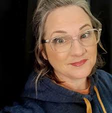 Who recommends a groomer for a Golden Doodle?