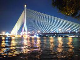 チャオプラヤ川にかかるラマ８世橋を眺めるレストラン ギンロムチョムサパーンです 本帰国したお友達のリクエストで行ってきました 橋がホントにキレイに見えてロマンチックな場所でした sydney opera house landmarks opera house