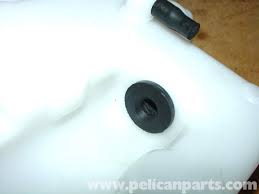 mercedes benz w210 windshield washer fluid reservoir replacement 1996 03 e320 e420 pelican parts diy maintenance article mercedes benz w210 windshield washer