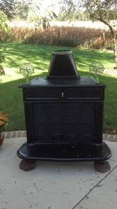 An Old Wood Stove Re Purposed As An Outdoor Fire Place For My Patio Guess What I M Gonna Do With That Old Stove I Wood Stove Backyard Bonfire Outdoor Fire