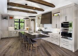 Modern Prairie Style On The Thornapple River Trukitchens In 2020 Modern White Kitchen Island White Modern Kitchen White Kitchen Island