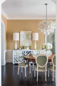 Fresh And Summery Dining Room With Oly Studio Muriel Chandelier Www Olystudio Com Transitional Dining Room Dining Room Design Dining Room Decor