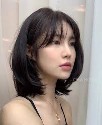 Medium length hairstyles with bangs korean. 10 Effortlessly Flattering Curtain Bangs Haircuts