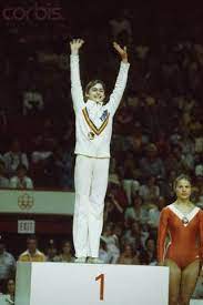 She won gold for uneven bars. Nadia Comaneci Makes History With Her Perfect 10 Performance In Montreal Nadia Comaneci Olympic Games Nadia Comaneci Perfect 10
