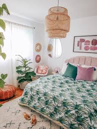 Click here to see the extreme before and after of my diy bedroom makeover reveal. A Tropical Bedroom Makeover Erika Carlock Bohemian Lifestyle Blog Tropical Bedrooms Bedroom Makeover Luxurious Bedrooms