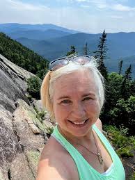 On Rte 16 just before the Great Gulf trailhead parking area there is a road  to "Camp Dodge"