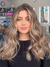 Best Hair Colours To Look Younger Glam Blonde With Waves In 2021 Cool Hairstyles Cool Hair Color Hair Inspo Color