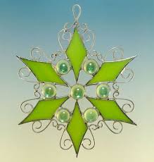 Beautiful stained glass cross with filigree in center. Peridot Lime Green Jeweled Stained Glass Filigree Snowflake Ornament Stained Glass Ornaments Stained Glass Christmas Stained Glass Jewelry