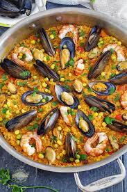 An Easy Version Of The Classic Spanish Dish Seafood Paella Recipe Paella Recipe Seafood Paella Recipe Seafood Recipes