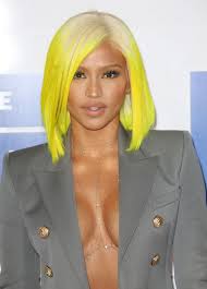 The look involves shaving the lower portion of the hair or cutting it very short while the top hair stays long or longer. Cassie Ventura Party Shefalitayal