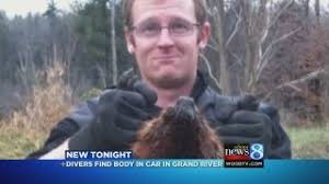 Hunter's body found in car in river