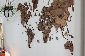 Featuring over six contrasting shades of wood, it is one of our most stylish wall maps! 3d Wood World Map Two Paws Farmhouse