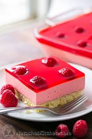 This raspberry pretzel jello salad or dessert is so easy to make and is the perfect combination of once it is firm, slice it, serve it, and enjoy it! Jello Cake Recipe Raspberry Jello Cake Recipe Jello Mousse Cake