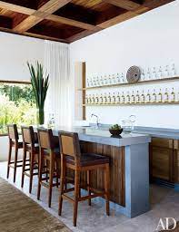 If youre not looking for a bar, but want to add seating to your dining room, a bar table and stool set is another great option. Home Bar Furniture And Design Ideas Architectural Digest