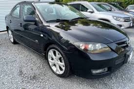 Image result for Sparkling Black 2007 Mazda3