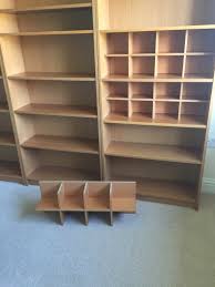 Converts backless wood shelf to display two rows of cds or dvds. Ikea Billy Insert Novocom Top