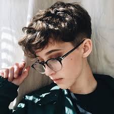 This dark brown tomboy haircut is bold and beautiful. Pin By Emily M On Hair Tomboy Hairstyles Tomboy Haircut Short Hair Styles
