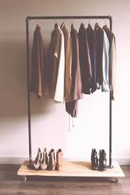 You can build your own clothes rack with a few basic tools—plus can be moved anywhere, and takes up very little space. Https Encrypted Tbn0 Gstatic Com Images Q Tbn And9gcrprzvh Oz1ji3jjchcmxr Vauhc5bly13jta Usqp Cau