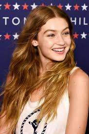 18 Highlighted Hairstyle To Inspire Your Next Color Appointment Gigi Hadid Outfits Gigi Hadid Brown Hair With Highlights