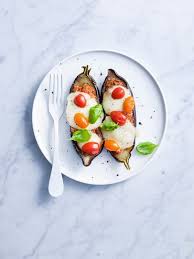 Aubergine Gevuld Met Gehakt En Mozzarella Recept Kerstomaatjes Mozzarella Gehakt