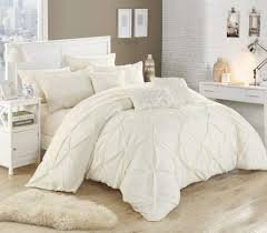 Now that you have an idea of what to look for when you buy a comforter, it's time to look at some of the best options the online market has. Amazon Com Chic Home 10 Piece Hannah Pinch Pleated Ruffled And Pleated Complete King Bed In A Bag Comforter Set Beige With Sheet Set Home Kitchen