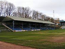 Take the a629 to halifax town centre, take the 2nd exit at the roundabout following signs for a629 (huddersfield), then into skircoat road where you will find the ground. The Shay Wikipedia