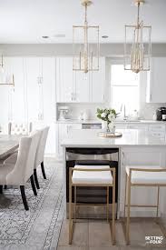 Our Dark To White Kitchen Remodel Before And After Rug Under Dining Table White Kitchen Remodeling Dining Rug