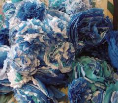 Fold 2 sheets of tissue paper in half and cut it into a square with the folded edge at the top. How To Make Tissue Paper Flowers Whimsical Party Decorations And Favors Feltmagnet Crafts