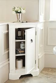 A bathroom corner cabinet is a great way to save space in your home. Corner Shelf Bathroom Storage Bathroom Floor Storage Bathroom Floor Cabinets White Bathroom Storage