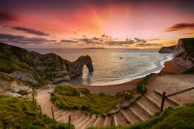 Sunset At Durdle Door (22376693076).jpg ...