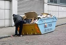 The sky was clear blue like an untouched pool of summer, but the cold wind reminded that summer was past. Dumpster Diving Wikipedia