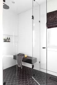 Contemporary Black And White Shower Boasted Black Fan Shaped Floor Tiles And White Stacked Wall Tiles With A Glossy Shower Floor Tile Shower Floor White Shower