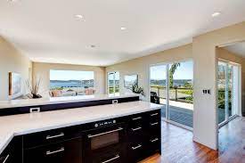 A marble top dining table looks chic in both black and white; Modern Kitchen And Living Room Design Open Plan Design Idea Stock Image Image Of Kitchen Style 37475887