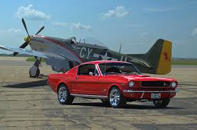 Maybe you would like to learn more about one of these? 1965 Mustang Fastback And P51 Mustang Photograph By Tim Mccullough