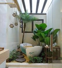 Terdapat dua lemari kecil bewarna putih yang menempel di dinding sehingga tampak rapi. 25 Model Dan Desain Kamar Mandi Bernuansa Alam