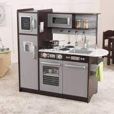 Interactive features like clicking, turning knobs, appliance doors that open and close, realistic burners, working chalkboard and more, kids can discover and explore their culinary side. Kidkraft Uptown Espresso Wooden Play Kitchen Walmart Com Walmart Com