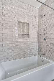 Browse all our bath posts for new ideas (could a black bathtub be in your future? Bathtub Shower Combo With Tiled Niche Modern Bathroom New York By Kraftmaster Renovations
