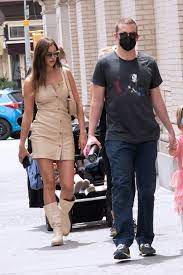 The official website of irina shayk. Irina Shayk Walks With Bradley Cooper In A Beige Minidress