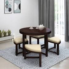 Consider placing a round ottoman coffee table off to one side of any seating configuration. Kendalwood Furniture Round Dining Table With 4 Chair Solid Wood 4 Seater Dining Set Price In India Buy Kendalwood Furniture Round Dining Table With 4 Chair Solid Wood 4 Seater Dining