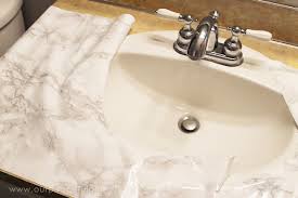 The only trouble was the green countertops, which made the bathroom feel dark and dingy stacy covered her rental countertop with contact paper & this is what happened. How To Do A Sturdy Stunning Granite Contact Paper Countertop Makeover