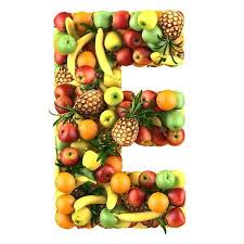 Letter E Made Of Fruits Isolated On A White In 2020 Lotus Logo Picture Letters Lettering