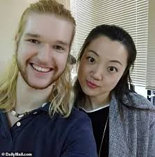 College student is reunited with his family after being locked up for eight  months in China