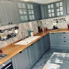 A House Full Of Personal Touches In Which The Gray Color Is In Focus Color Focus Full Gray House Person Country Kitchen White Baseboards Grey Wall Color